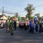 Amankan Pawai Ta’aruf 1 Muharram di Widodaren, Sinergi TNI-Polri Kawal Ribuan Santri